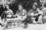 a group of men sitting next to each other